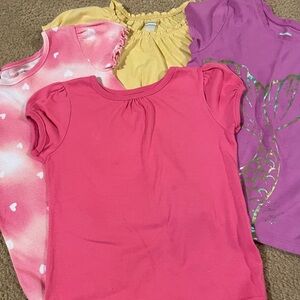 Four 4T shirts